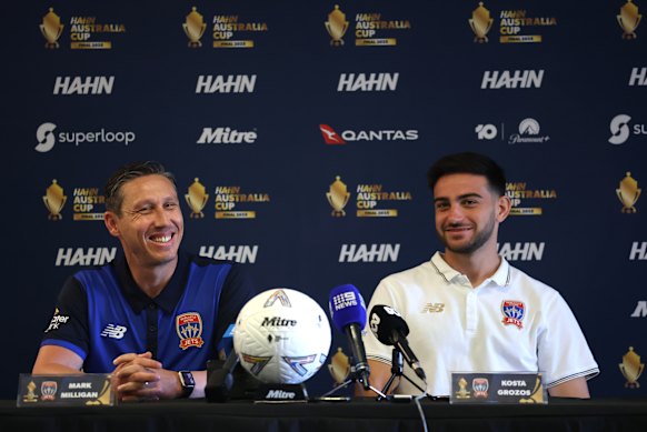 Jets coach Mark Milligan and Jets captain Kosta Grozos.
