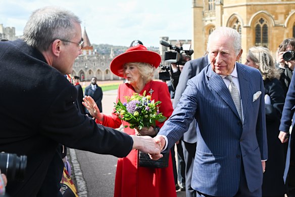 Queen Camilla and King Charles III spent time after the service speaking with the crowd, which had been waiting behind barriers at St George’s Chapel in Windsor.