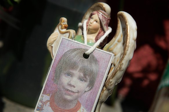A photograph of Etan Patz at a makeshift memorial in the SoHo neighborhood of New York in 2012.