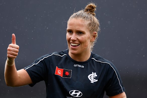 Tara Bohanna of the Blues gives the thumbs up pregame.