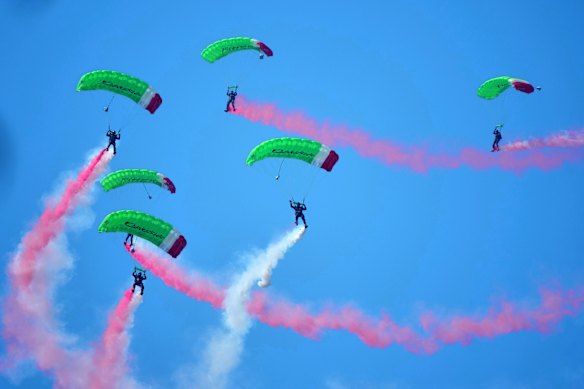 Indonesian special forces skydivers perform during a flag hoisting ceremony commemorating the country’s 81st anniversary of independence at Merdeka Palace in Jakarta, Indonesia.