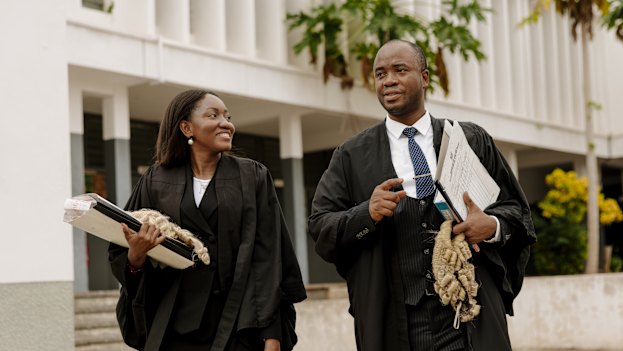 IJM lawyer Nana Ama Doe Badu and  senior state attorney Andrews Dodzi Adugu at the Ho courthouse.