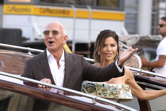Jeff Bezos and Lauren Sanchez leave their pre-wedding reception in Venice.