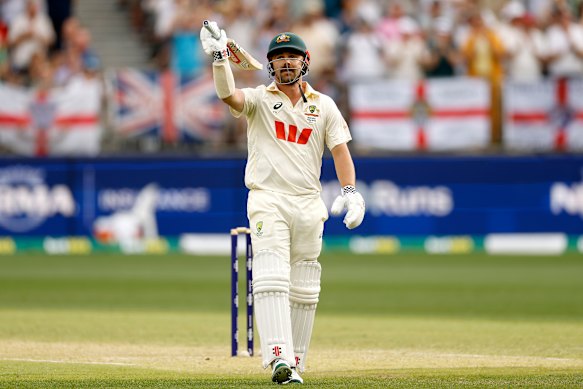 Travis Head raises his bat after his stunning knock in Perth.