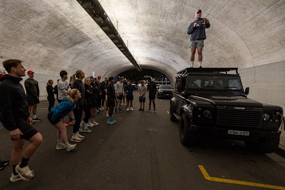Club co-founder Sam Dreyfus addresses members of the Unofficial Run Club before their 6.5-kilometre dash.