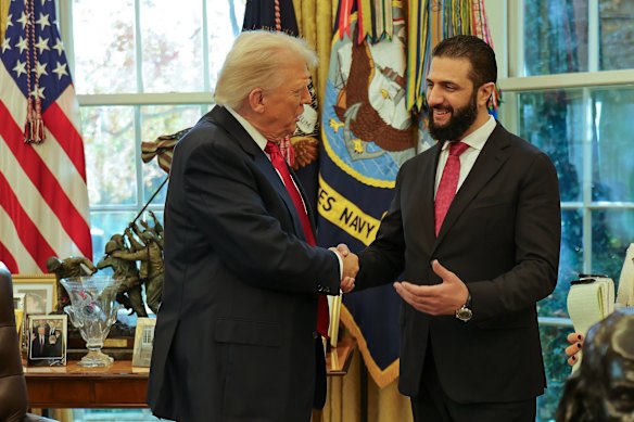 US President Donald Trump shakes hands with Syria’s President Ahmad al-Sharaa at the White House. 