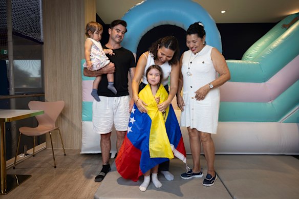 Jackeline Giovannucci, centre, and her family on Sunday afternoon.