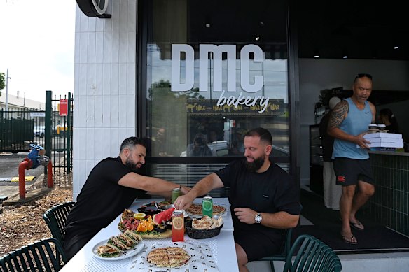 DMC Bakery owners Omar Said (left) and Mohamad Semawy (left) with some of their most popular dishes on the menu.