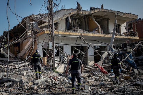 Firefighters search a building for survivors minutes after an Israeli airstrike on April 13, 2026 in Nabatieh, Lebanon. Continued Israeli bombardment of Nabatieh has turned the city into a ghost town, most of the cities residents have left, for medical teams working in the city comes at huge risk. In recent weeks ambulances, rescue crews and paramedics across Lebanon have come under repeated Israeli attacks.