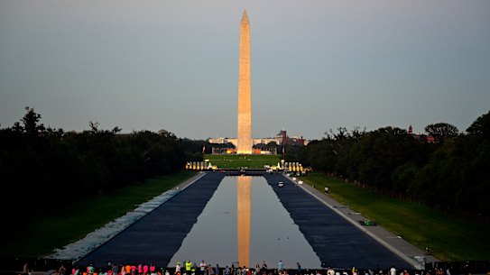 The Reflecting Pool is supposed to be a solemn place for visitors between the Washington Monument and Lincoln Memorial.
