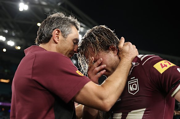 Billy Slater and Cameron Munster share a moment at full-time.