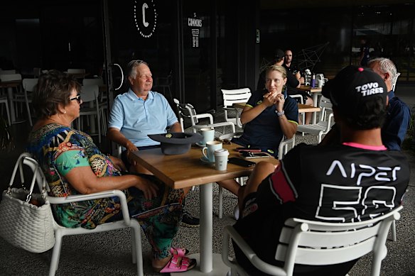 Australia’s women’s cricket captain Alyssa Healy with her parents Sandy and Greg Healy and husband Mitch Starc (back to camera) on Tuesday moments before officially announcing her retirement.