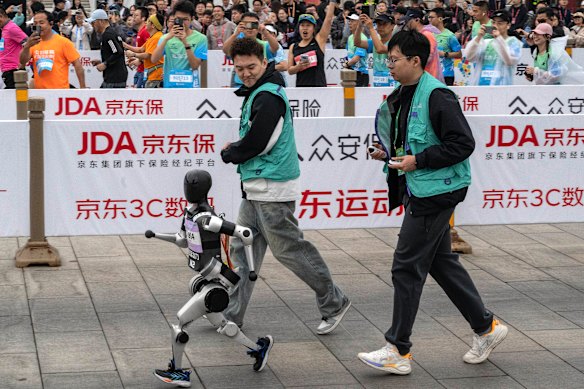 A robot competes in a half-marathon in Beijing.