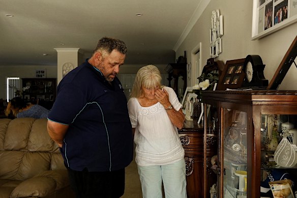 Cheryl Webber and her son Darrell Hangan with the photos and mementos of Caroline and Jessica at Webber’s home in Dubbo, Central West NSW.