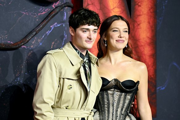 Noah Schnapp and Millie Bobby Brown attend the Stranger Things season five special screening in London.