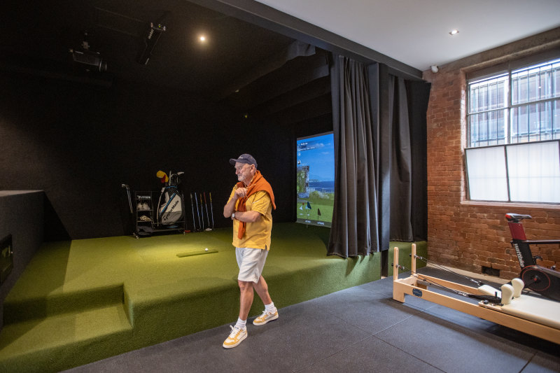 Andy Lee’s investment property included a golf driving range simulator.