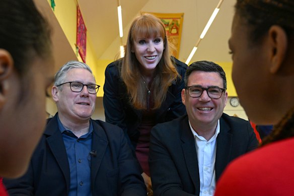 Keir Starmer, former deputy PM Angela Rayner and Andy Burnham meet schoolchildren during a visit to a primary school last month. Rayner and Burnham are both seen as credible successors to the PM.