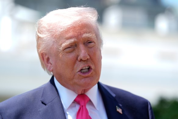 President Donald Trump speaks to reporters on the South Lawn of the White House on Thursday in Washington.