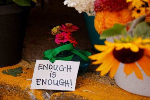 A sign at a make-shift memorial after a shooting at a school in Minneapolis last month.