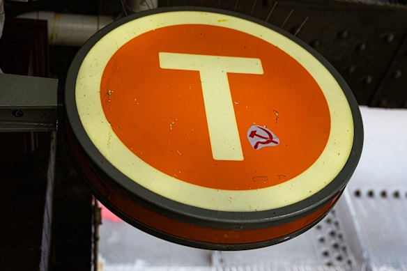 Decoration on the sign marking the entrance to Macdonaldtown station.