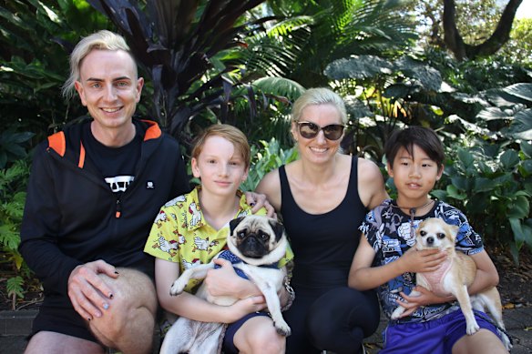 Chris, Will, Maren and Joon with Zelda the pug and Henry the chihuahua.
