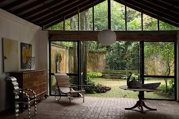 Inside the home at Lunuganga, which features terracotta tiles, wood and reclaimed items, like many of Bawa’s designs.