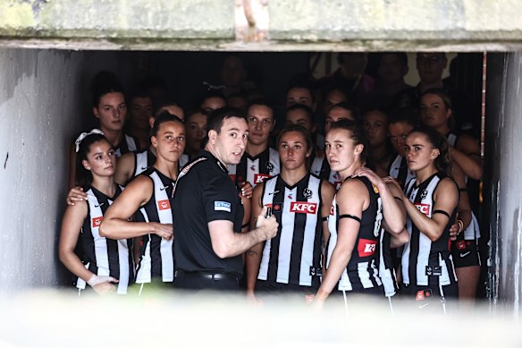 Collingwood coach Sam Wright and his team.