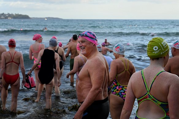 Members of the Bold and the Beautiful swimming club setting out from Manly to Shelly Beach. The small waves make it easier for ocean swimmers to get past the break.