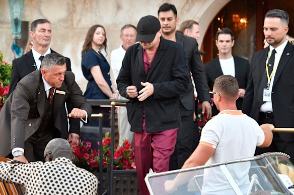 Leonardo Di Caprio did his best to keep his pyjamas hidden.