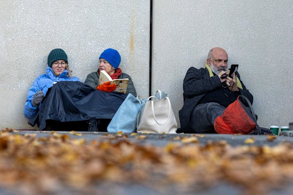 People waiting to get into the court during the trial.