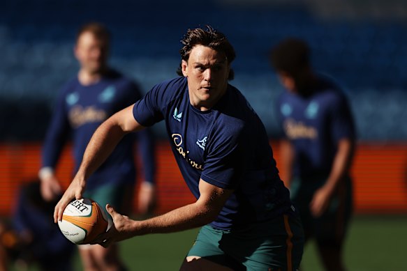 Tom Hooper passes during a Wallabies captain’s run in July.