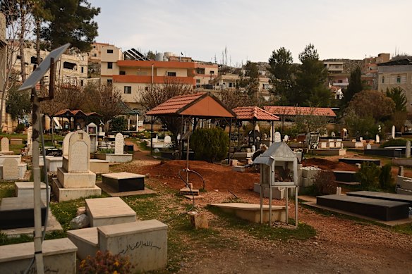 Fresh graves at the Nabi Chit cemetery.