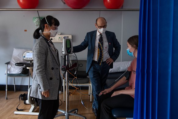 A patient is treated by Dr Steven Faux and Dr Morgan Hee at the long COVID unit in St Vincent’s Hospital, Sydney.