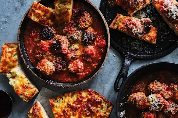 Serve these oven-baked meatballs with cheesy garlic bread.