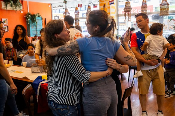 Venezuelan-Australians gather in a Melbourne restaurant to celebrate the ousting of Nicolas Maduro.