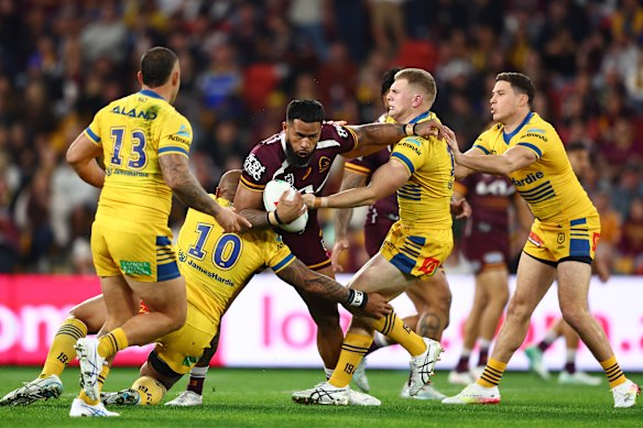  Payne Haas of the Broncos is tackled during the round 21 NRL match between Broncos and Eels at Suncorp Stadium, on July 25, 2025, in Brisbane, Australia.