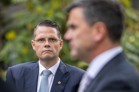 Shadow treasurer James Newbury keeps a close eye on party leader Brad Battin.