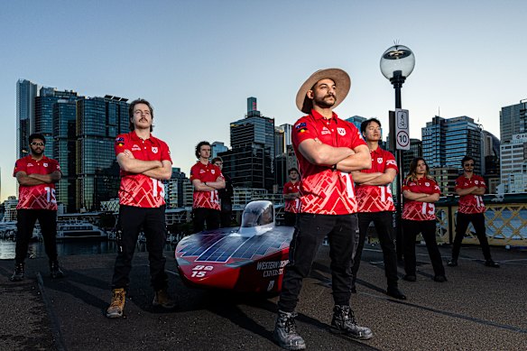 Members of the Western Sydney Solar Car Challenge team with their vehicle, UNLIMITED 6.0. 