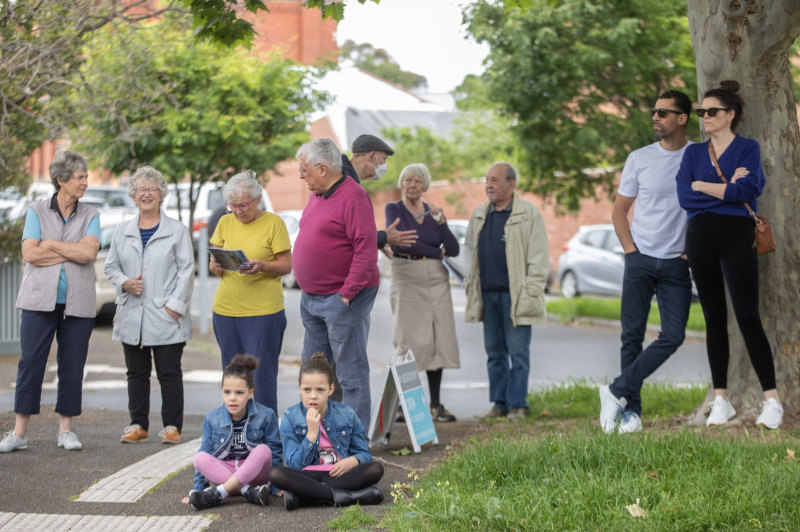 The crowd watched on as three bidders competed for the home.