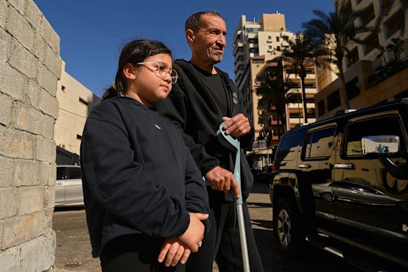 Ahmad Sweidan, with his granddaughter Fatima, never thought Israel would strike this part of the city.