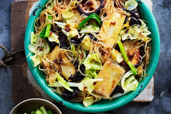 Stir-fried glass noodles with fresh shiitakes, tofu and cabbage.