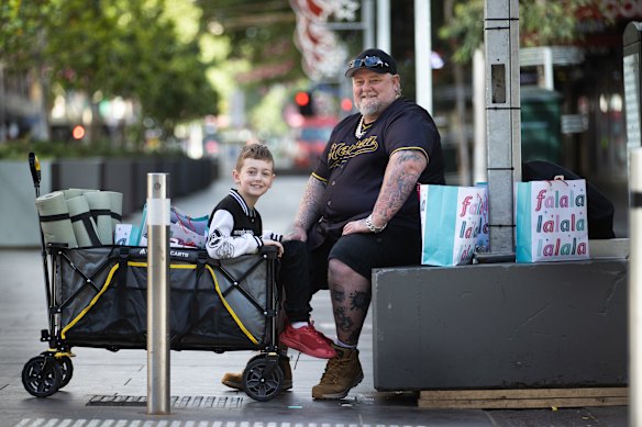 Derek and Jackson Glennie in Melbourne’s CBD on Christmas Day. 