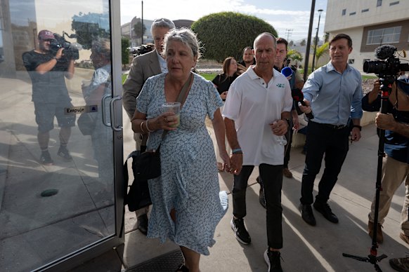 Debra and Martin Robinson, the parents of Callum and Jake Robinson, arrive at court for the first day of the trial of the men accused of killing their sons.
