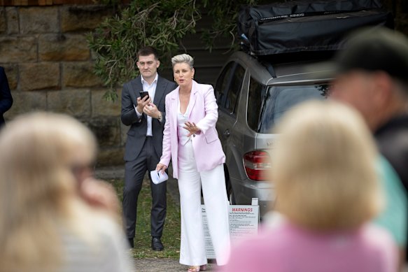 Auctioneer Emma Brown-Garrett runs proceedings in Maroubra.