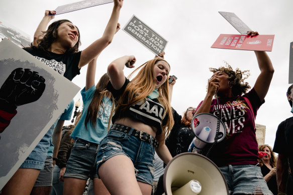 Anti-abortion activists celebrating the Supreme Court’s decision to overturn Roe v. Wade in Washington in 2022. In response, Ms. Harris became the administration’s leading voice on abortion rights. 