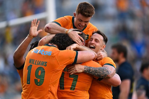 The Wallabies celebrate a great win in Townsville.