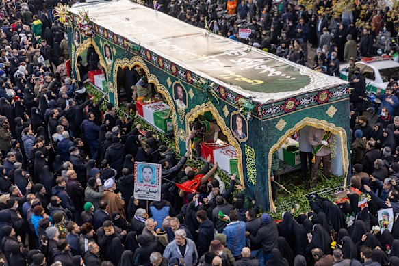 The caskets of members of Iran’s security forces, whom authorities said were killed during recent nationwide protests, during a mass funeral outside Tehran University on Wednesday.