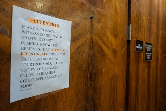 A sign is posted outside of county Judge Hannah Dugan’s courtroom at the Milwaukee County courthouse, on Friday.