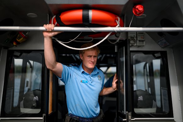  Constable Nathan Bell onboard Water Police 41 on Sydney Harbour.