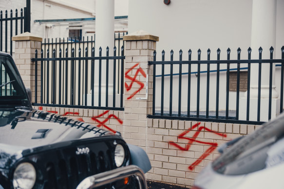 Displaying Nazi symbols will be punished with mandatory minimum sentences of a year. These swastikas were graffitied on a Sydney synagogue.